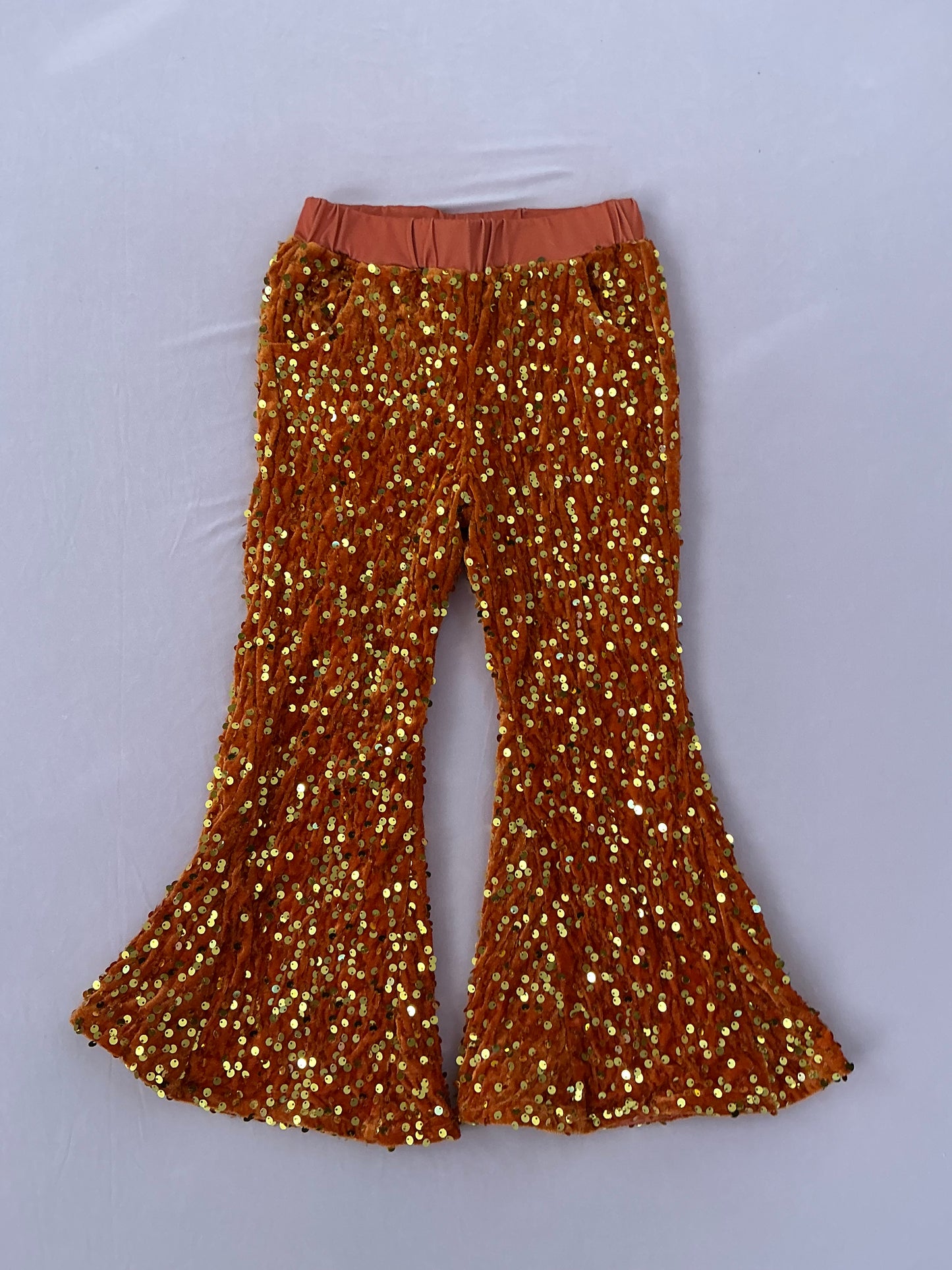 Orange sequin bell bottoms